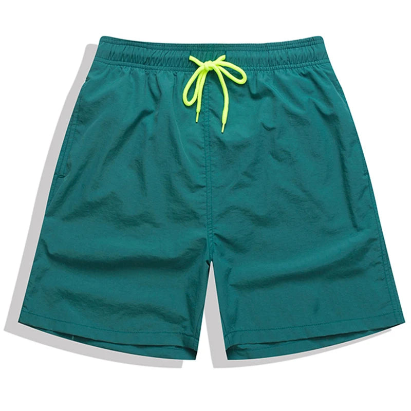 Men's ShopHub NZ swimwear boardshorts with breathable mesh liner and sporty nylon fabric, ideal for surfing and beach activities.