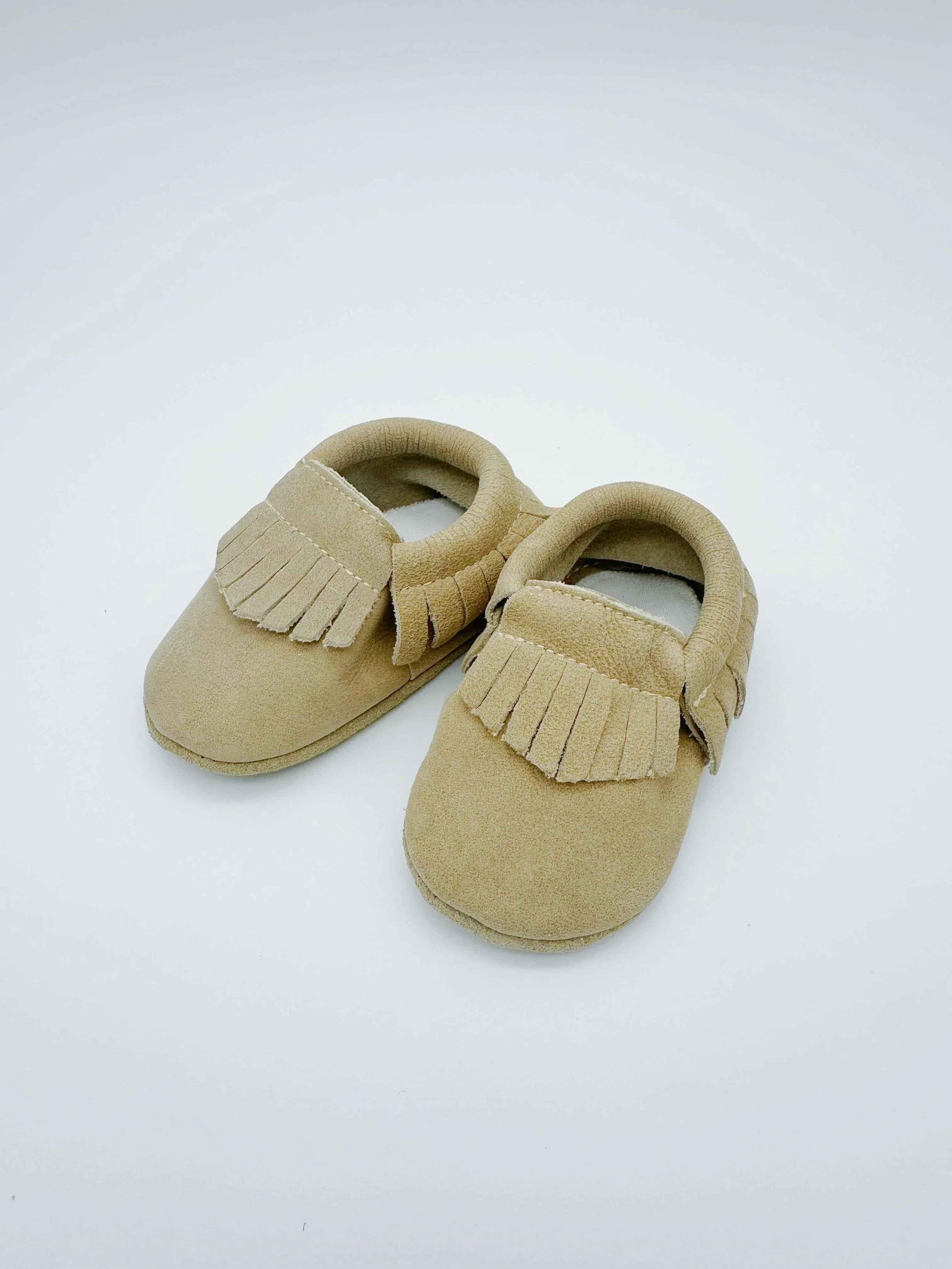 Fringe Beige Baby Leather Flat Shoes