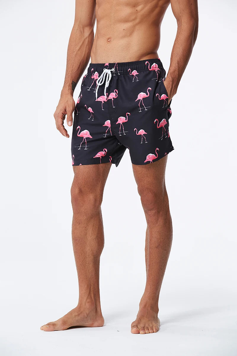 Men's summer beach print boardshorts by ShopHub NZ, surfing swimwear with pockets, suitable for beach, swimming, and fitness activities.