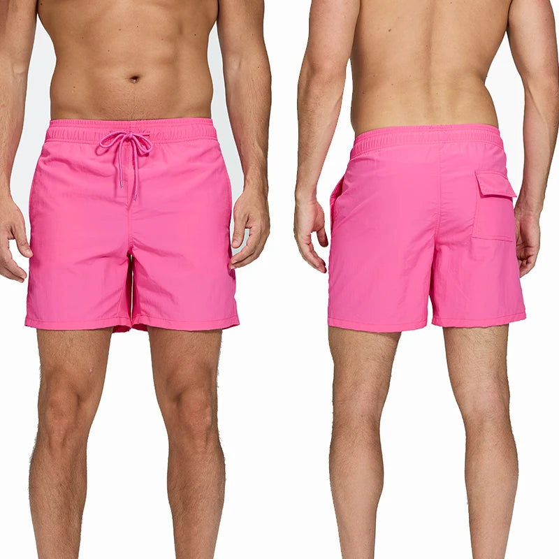 Men's surfboard shorts from DATIFER 2026 with breathable mesh liner, nylon material, and sporty design for swimming and beach activities.