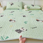 Cooling silk mattress pad set from ShopHub NZ designed for summer comfort, featuring soft, breathable fabric on a plush mattress.