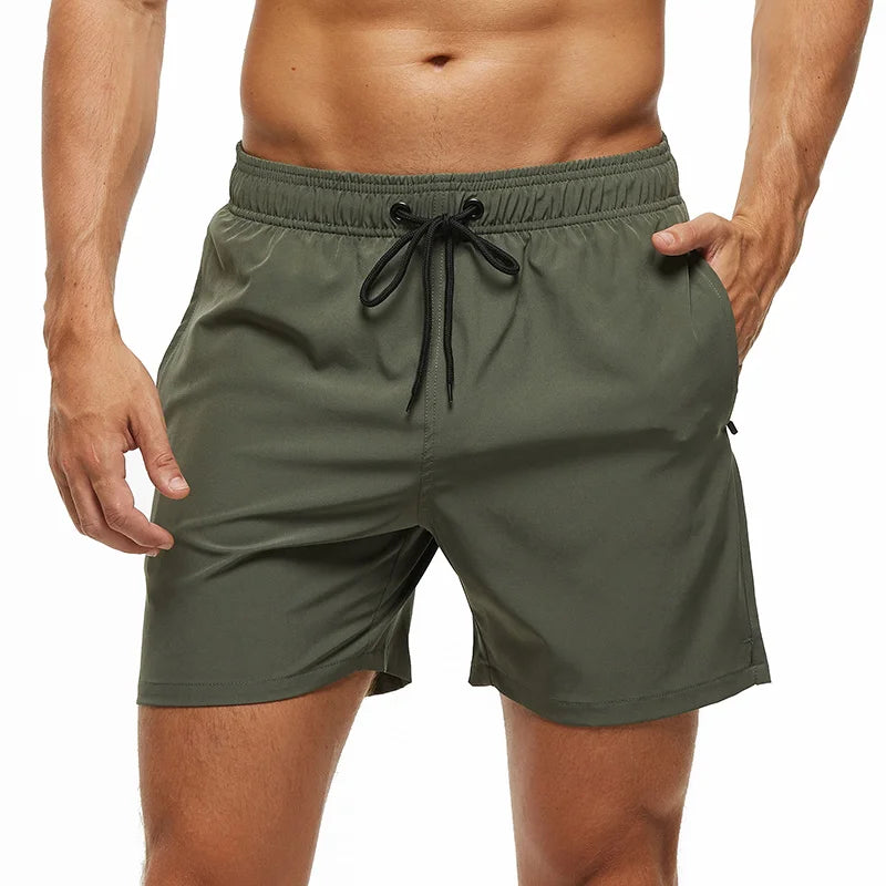 Men's Datifer 2026 summer boardshorts with breathable mesh liner, adjustable waist, zipper pockets, quick-dry fabric, in vibrant colors.