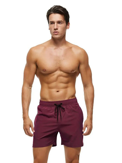 Men's summer swimming shorts by ShopHub NZ, quick-dry polyester with spandex, breathable mesh lining, and a pocket for convenience.