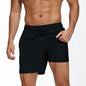 Men's summer boardshorts with elastic waistband, side zipper pocket, polyester-spandex fabric, suitable for gym, beach, and swim.