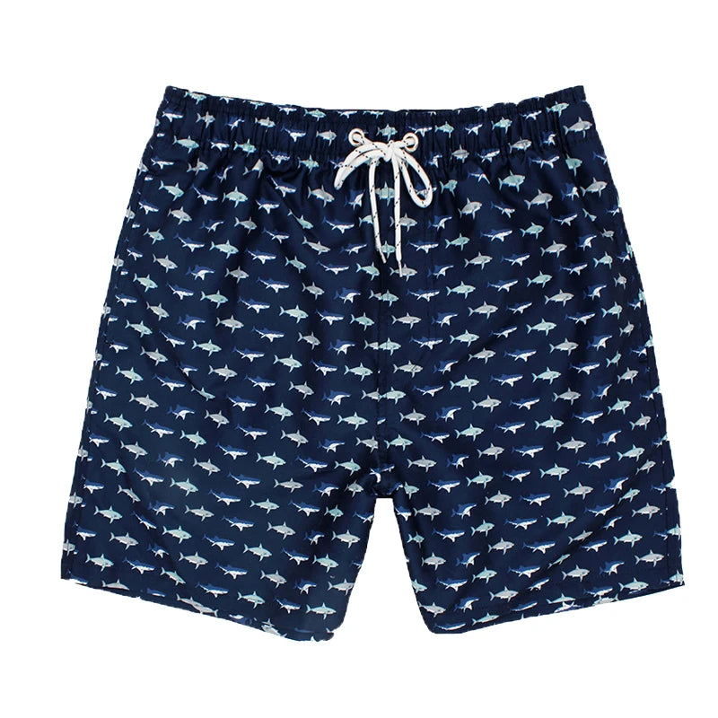 Men's summer swimming shorts by ShopHub NZ featuring colorful print, polyester fabric, mesh liner, ideal for swimming and sports.