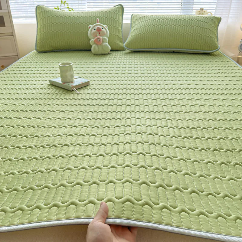 Cooling silk mattress pad set by ShopHub NZ, designed for comfort and temperature regulation during summer.