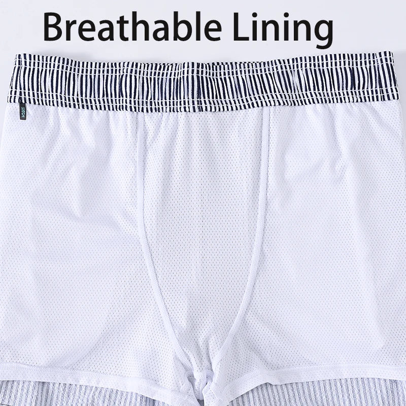 Men's boardshorts by ShopHub NZ featuring classic print, elastic waist, and 2-in-1 design, suitable for beach and swimwear activities.