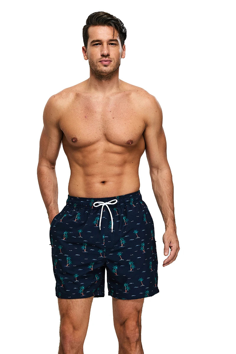 Men's polyester boardshorts with long lining, side zipper pocket, ideal for gym or swimming, from ShopHub NZ's summer 2026 collection.