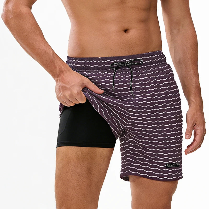 Men's boardshorts by ShopHub NZ featuring classic print, elastic waist, and 2-in-1 design, ideal for beach and swimwear.