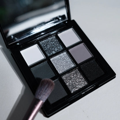 ShopHub NZ 9 Colors Eyeshadow Palette with a variety of vibrant and neutral shades for versatile eye makeup looks.