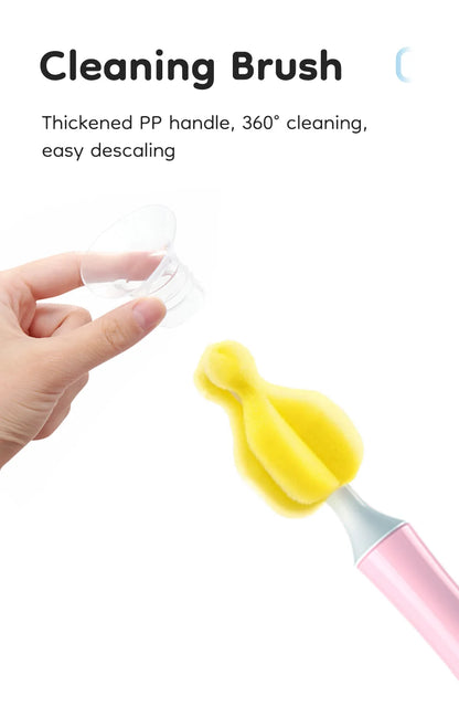 Cleaning brush with thick PP handle and pink and yellow design, held by a hand wearing a glove.