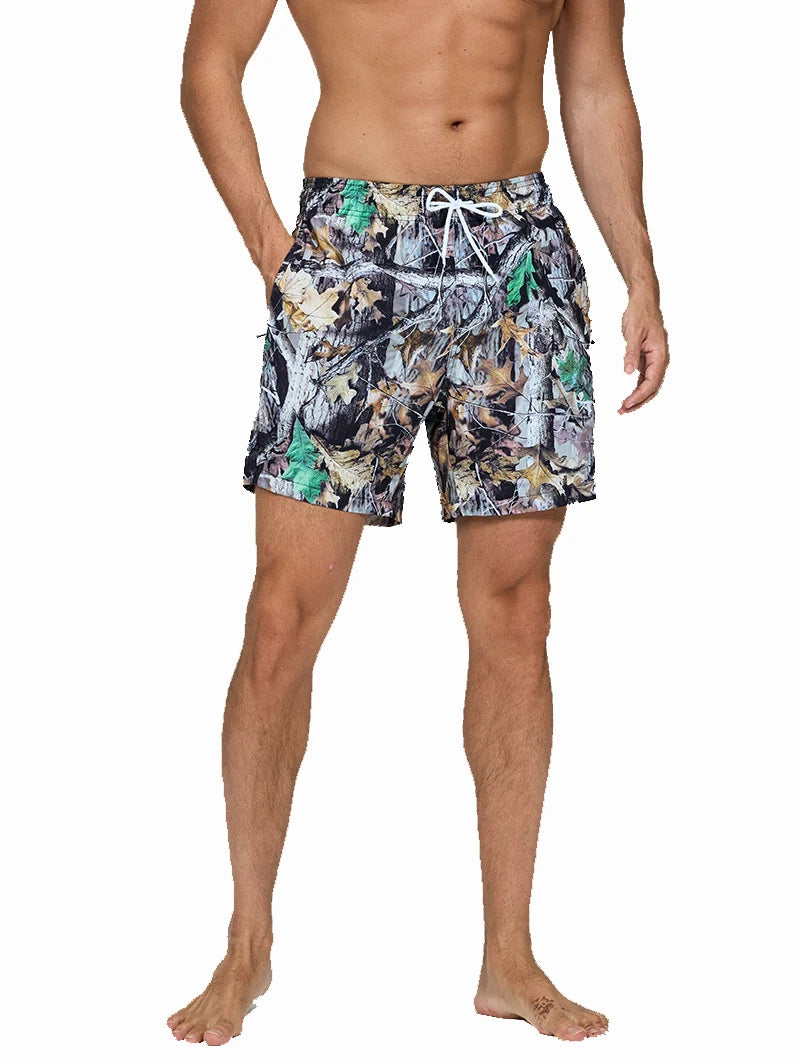 Men's multicolor Datifer brand polyester gym shorts with mesh liner, side pockets, quick-dry fabric, suitable for beach and swim.