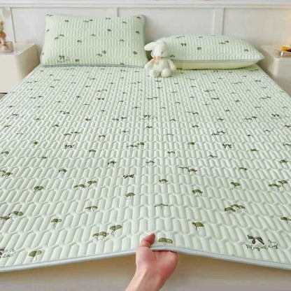Cooling silk mattress pad set by ShopHub NZ, designed for comfort and temperature regulation during summer nights.