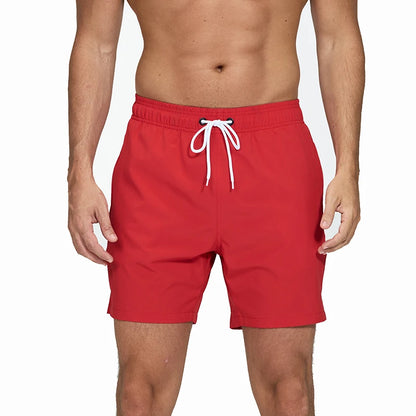 Men's summer boardshorts from ShopHub NZ with breathable mesh lining, zipper pockets, quick-dry fabric, ideal for beach and swimwear.