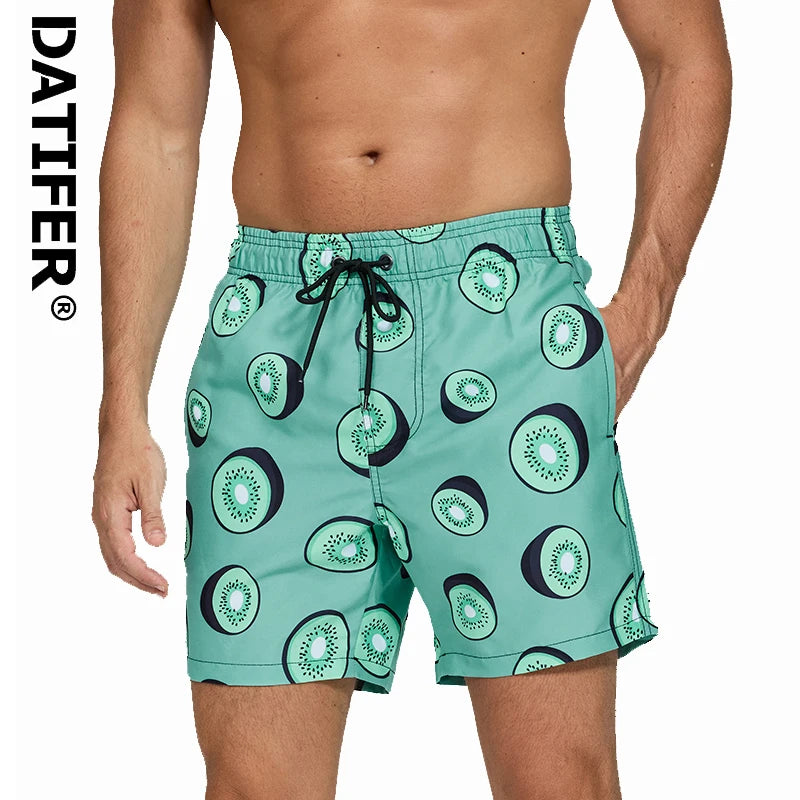 Men's blue DATIFER 2026 summer boardshorts from ShopHub NZ, featuring quick-dry fabric, ideal for surfing, swimming, and beach fitness.