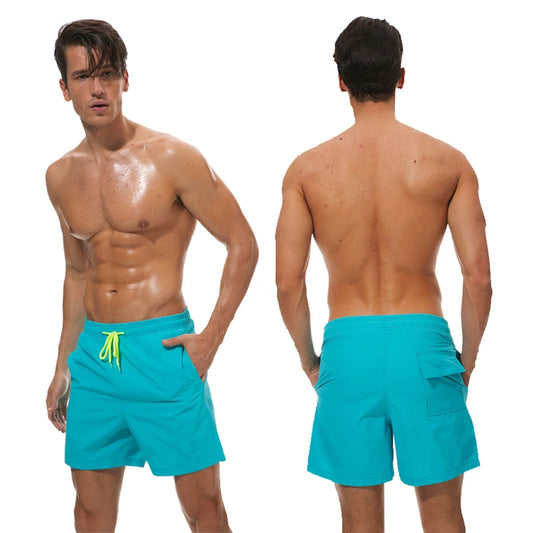 Datifer men's summer swimming shorts with solid color design, mesh lining, pockets, suitable for beach, running, and gym activities.