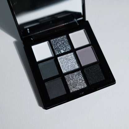 ShopHub NZ 9-colours eyeshadow palette with a variety of vibrant and neutral shades for versatile makeup looks.