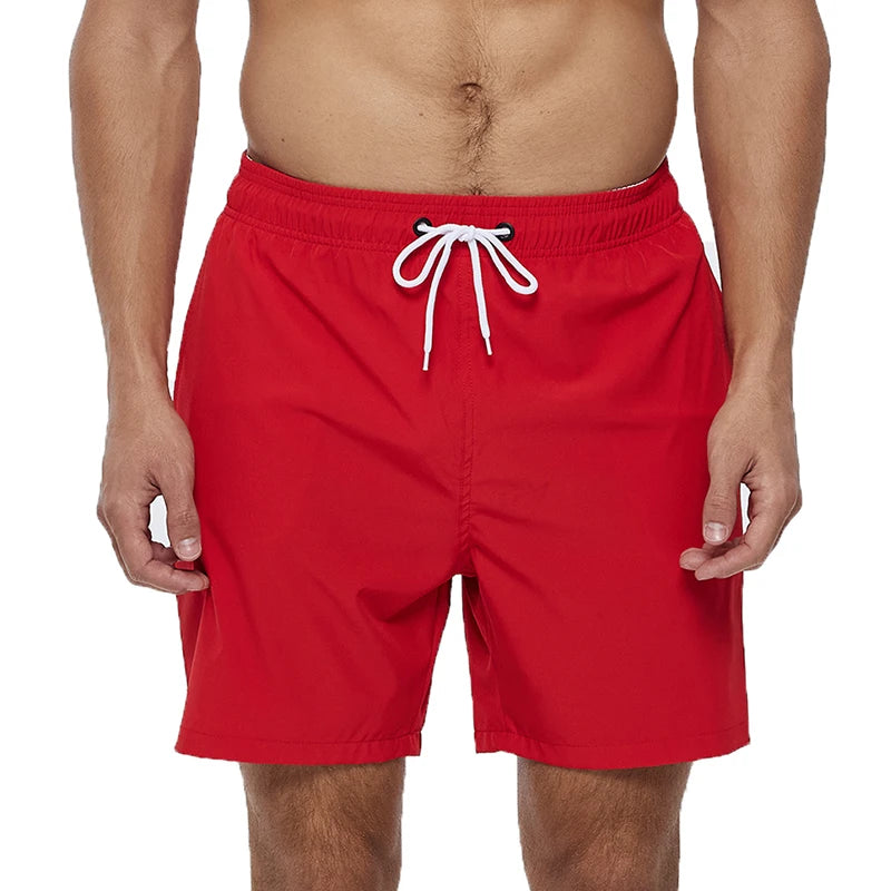 Men's summer swimming shorts by ShopHub NZ, polyester and spandex boardshorts with quick-dry fabric, breathable mesh lining, and pocket.
