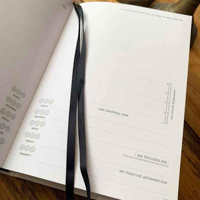 Natural linen gratitude journal for teenagers by Awesome Inc NZ, featuring positive affirmations and space for reflection.