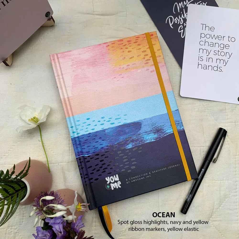 Ocean yellow You + ME Connection Gratitude Journals by Awesome Inc NZ, featuring inspirational design and open pages for reflection.