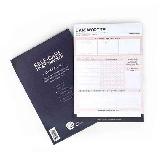 Self-care habit tracker notepad by Awesome Inc NZ with "I Am Worthy" message and daily habit tracking pages.