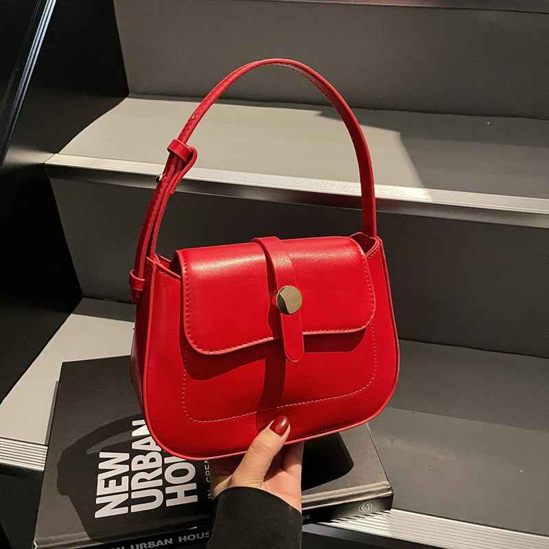 A versatile small square bag