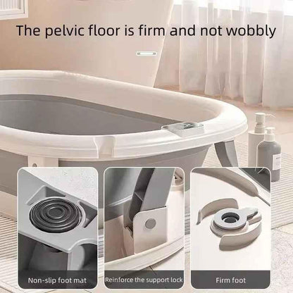 Foldable Baby Bath by Baby Way NZ with digital thermometer and newborn support rack in grey, suitable for gentle infant bathing.