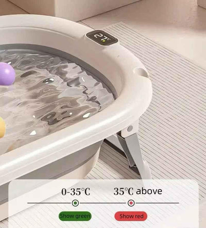 Foldable Baby Bath with digital thermometer and newborn support rack in grey, designed for safe and convenient bathing by Baby Way NZ.