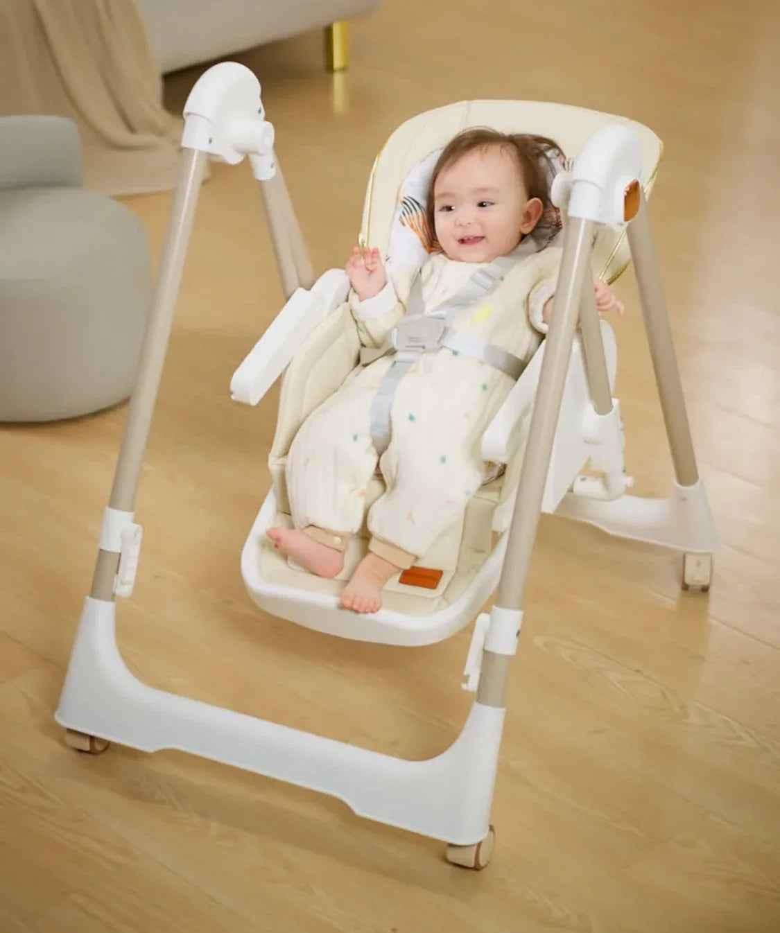Jupiter Beige Baby Way NZ 2-in-1 high chair and swing, featuring a beige frame with a comfortable seat and adjustable tray.