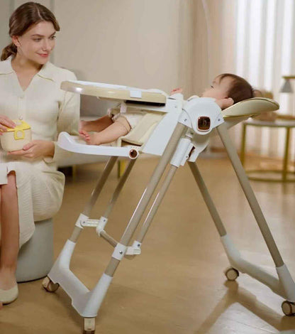 Jupiter Beige Baby Way NZ 2-in-1 high chair and swing for infants, featuring a sturdy frame and comfortable seating.