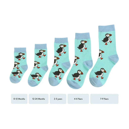 Barekind NZ bamboo socks for kids featuring a colorful puffin design, suitable for ages 0-12 months.
