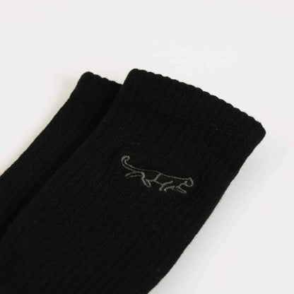 Barekind NZ black and white ribbed bamboo socks for adults, featuring a Save the Black Panthers design.