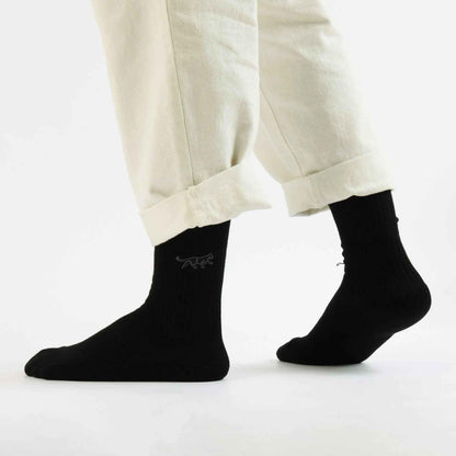 Barekind NZ black ribbed bamboo socks for adults, featuring Save the Black Panthers design. Comfortable and eco-friendly socks.
