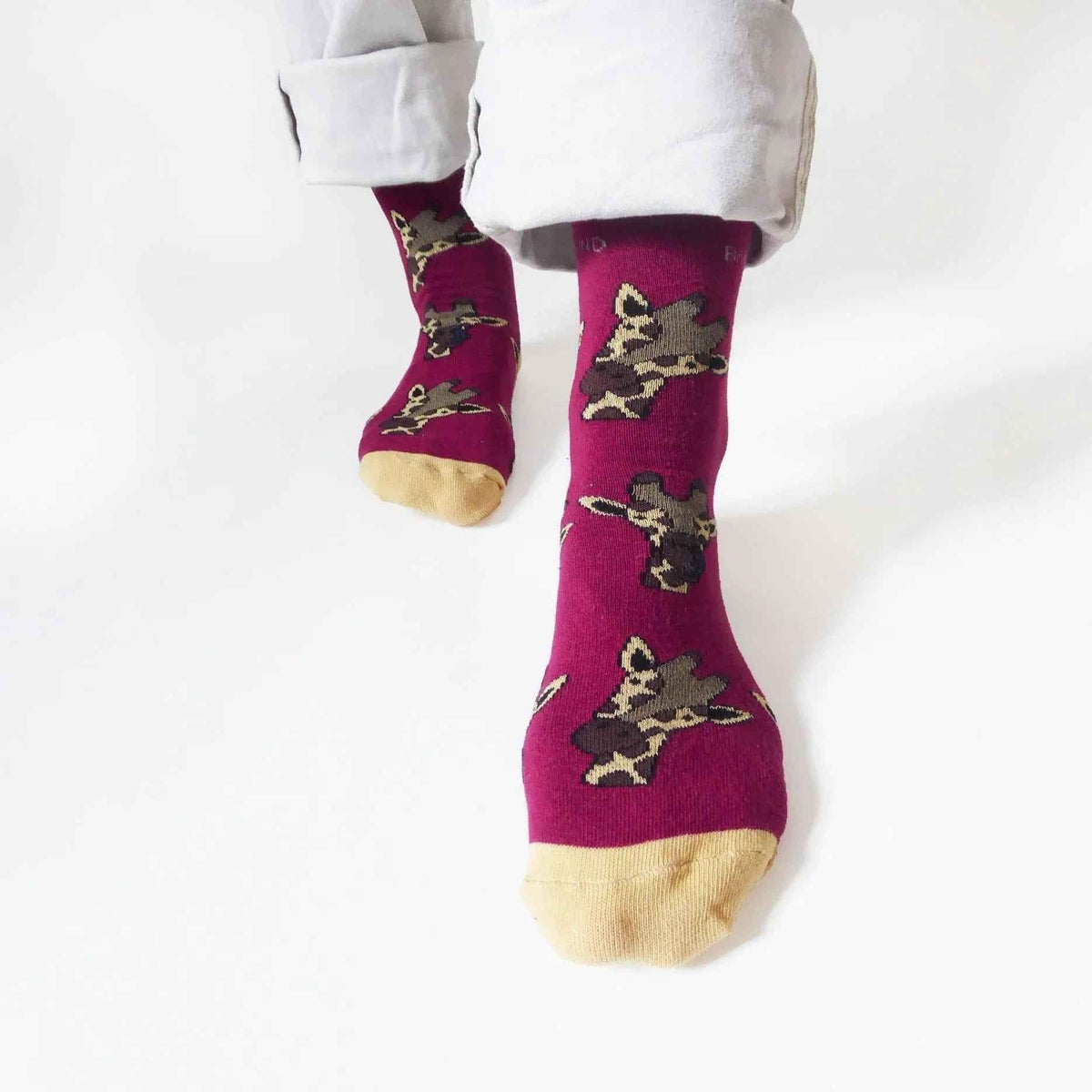 Barekind NZ bamboo socks featuring giraffe illustrations, designed for adult sizes 4-7, eco-friendly and comfortable.