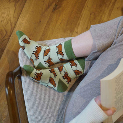 Barekind NZ bamboo socks featuring a green capybara design, comfortable adult socks made from eco-friendly bamboo material.