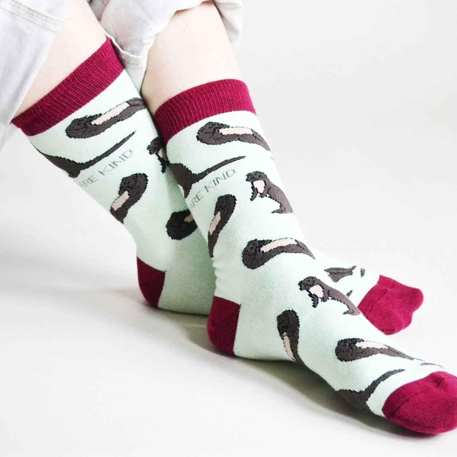 Barekind NZ bamboo socks featuring otter illustrations, designed for adults size 4-7, eco-friendly and comfortable footwear.