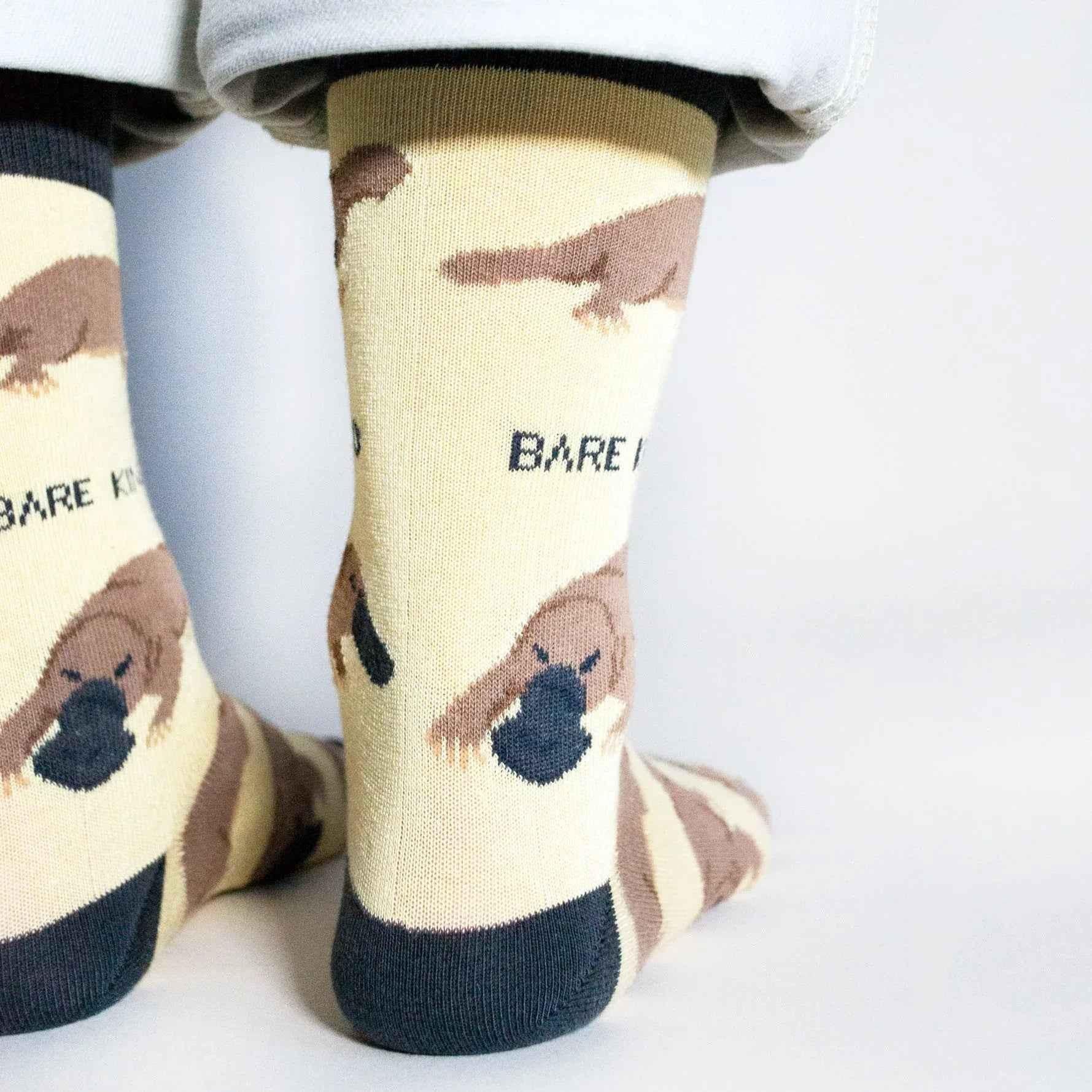 Barekind NZ bamboo socks featuring Save the Platypus design for adults, showcasing soft, eco-friendly sock material and colorful pattern.