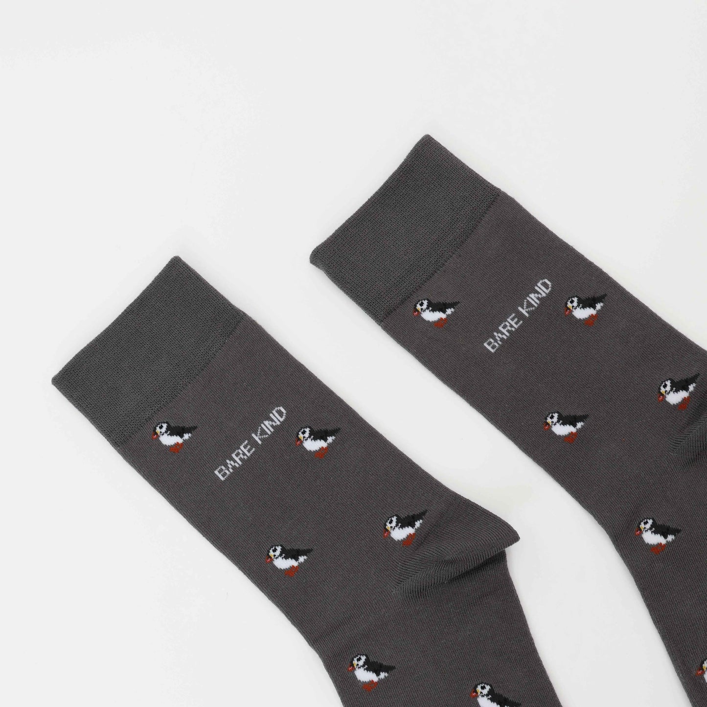 Barekind NZ Save the Puffin small motif bamboo socks for adults, featuring a colorful puffin design on soft, eco-friendly bamboo fabric.