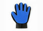Cool Kitty Cat Litter pet grooming glove for shedding, shown on left hand, used for gentle pet hair removal and grooming.