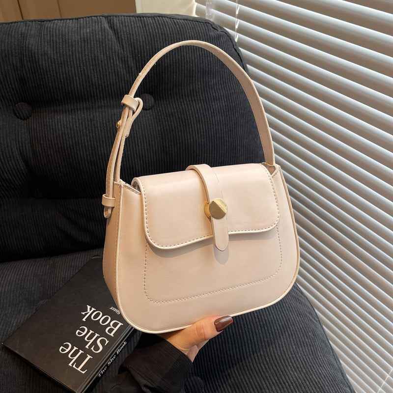 A versatile small square bag