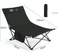 Black ECOTREK portable folding beach chair with enhanced size and comfort, showing its frame and padded seat.