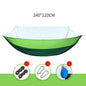Light green ECOTREK portable mosquito hammock with quick-open design and built-in net for outdoor relaxation.