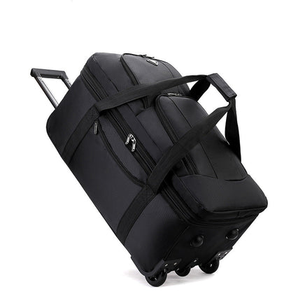 Black ECOTREK expandable rolling checked-in duffle bag with wheels, showing its spacious design and sturdy handle.