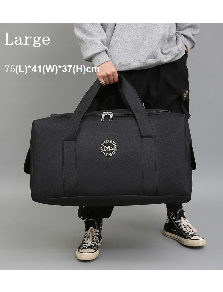 Small black ECOTREK outdoor travel and camping storage bag, 40L capacity, compact and durable for gear organization.