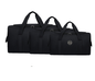 Small black ECOTREK outdoor travel and camping gear storage bag with 40L capacity, available in three sizes.