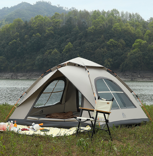 Large ECOTREK automatic pop-up waterproof camping tent set up outdoors, showcasing its durable fabric and spacious interior.