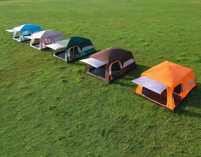 Green ECOTREK family outdoor camping tent, double-layer cabin tent set up outdoors, suitable for family camping adventures.