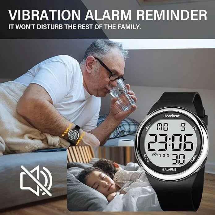 Silver Eldertech Hearkent Atomic Watch with vibrating alarms, showcasing a sleek design and digital display for precise timekeeping.