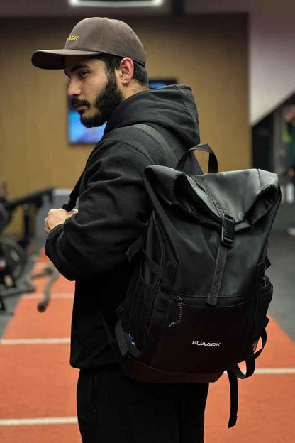Fuaark Nz Core Black backpack bag, stylish and functional everyday essential with multiple compartments and adjustable straps.