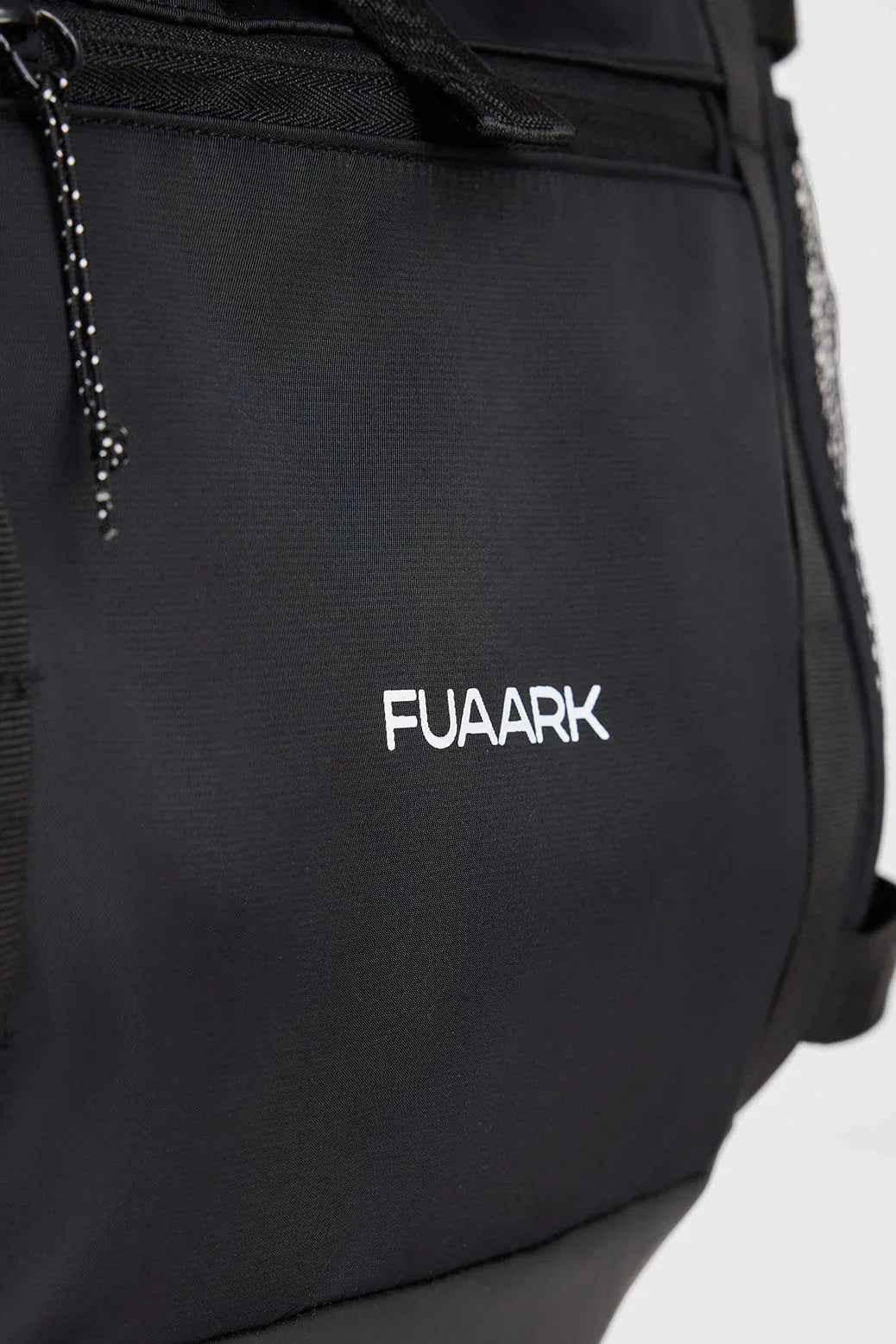 Fuaark Nz Core Black backpack bag with multiple compartments, stylish design, and functional features for everyday use.